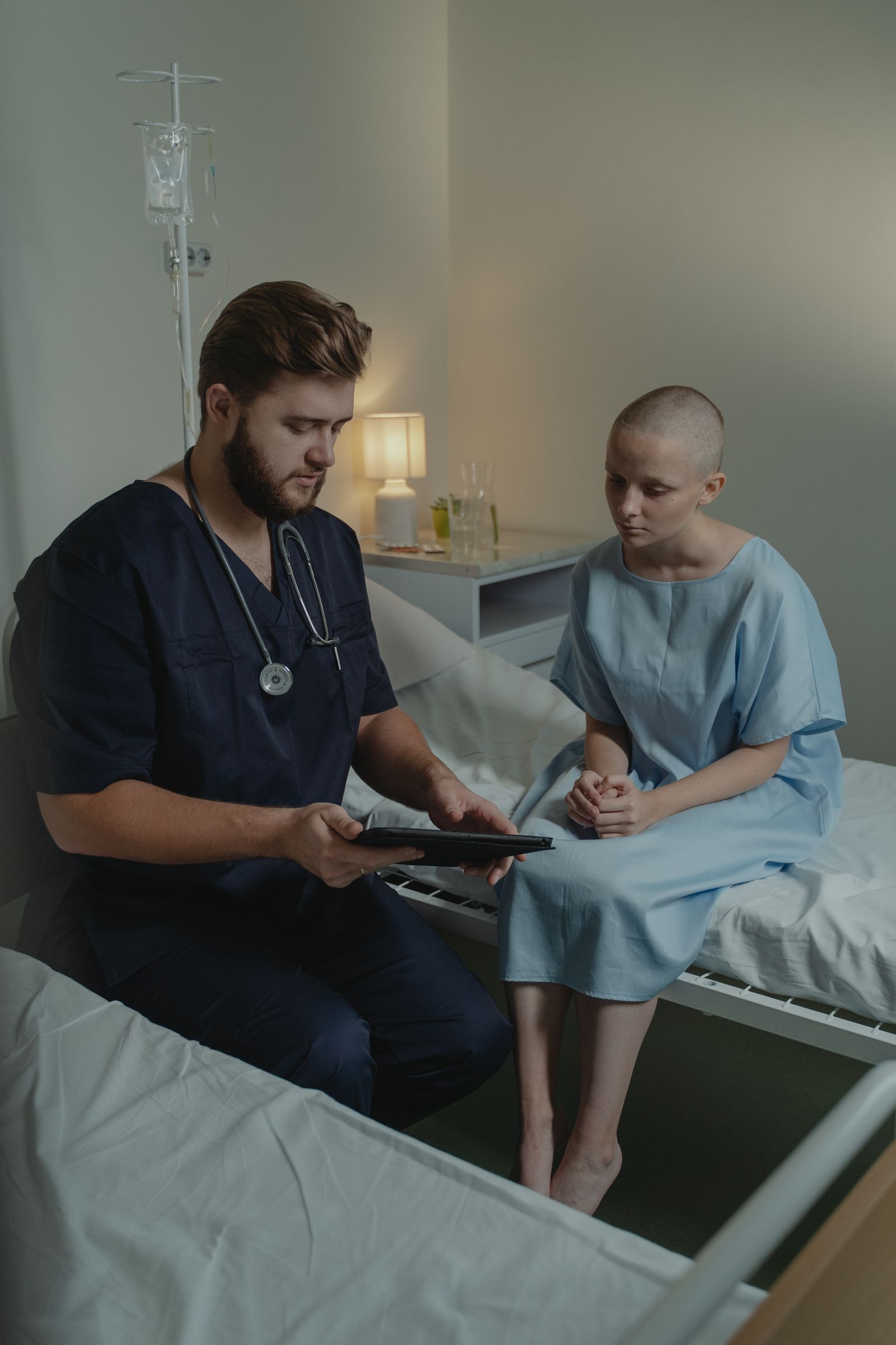 Nurse supporting an older adult patient