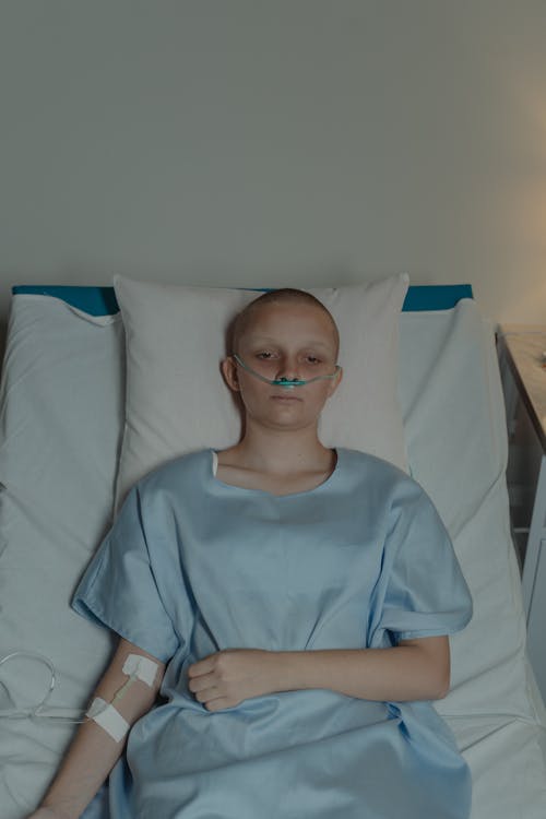 Free Bald Patient in Bed Stock Photo