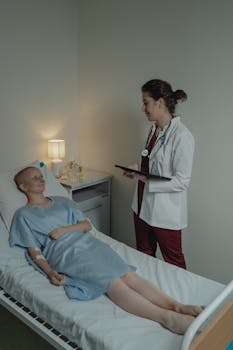Doctor and patient interaction in a hospital room, promoting healthcare support.