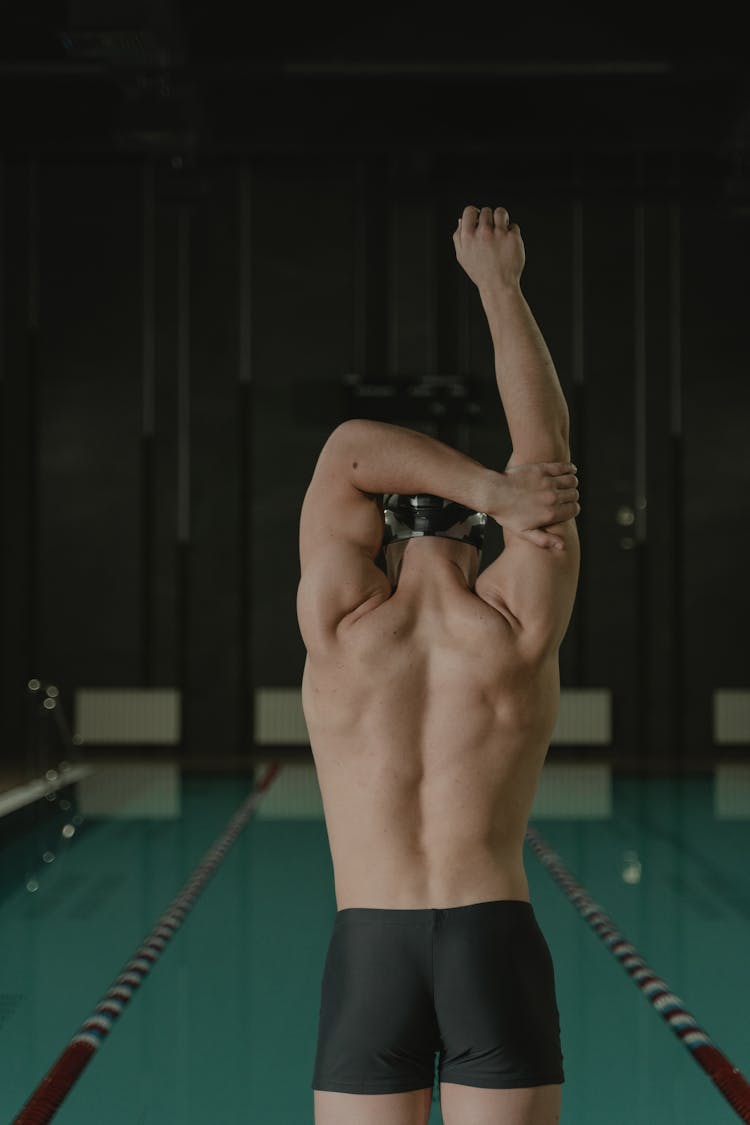 Shirtless Man Doing Arms Stretching