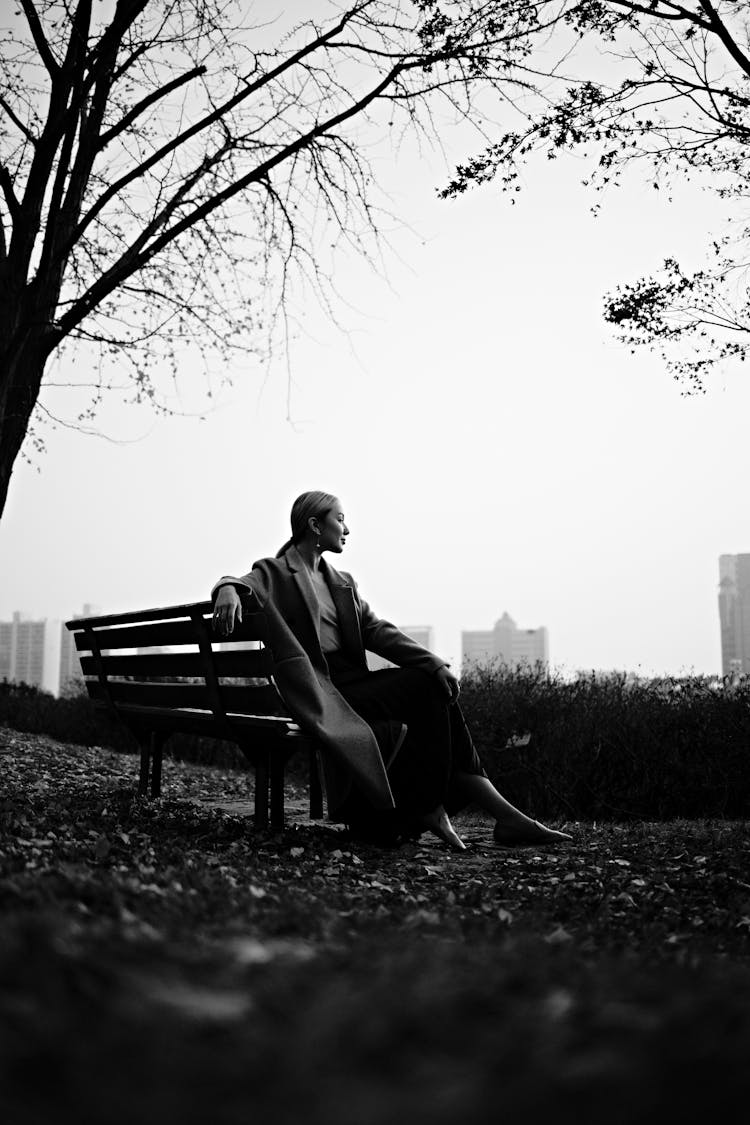 Young Happy Woman Smiling On Bench