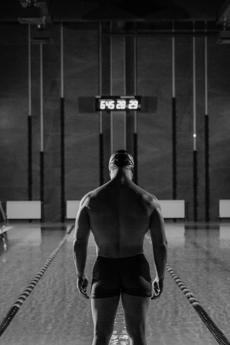 Man In Black Trunks Ready To Dive