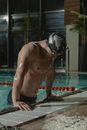 Man in Black Shorts Wearing Black Swim Cap