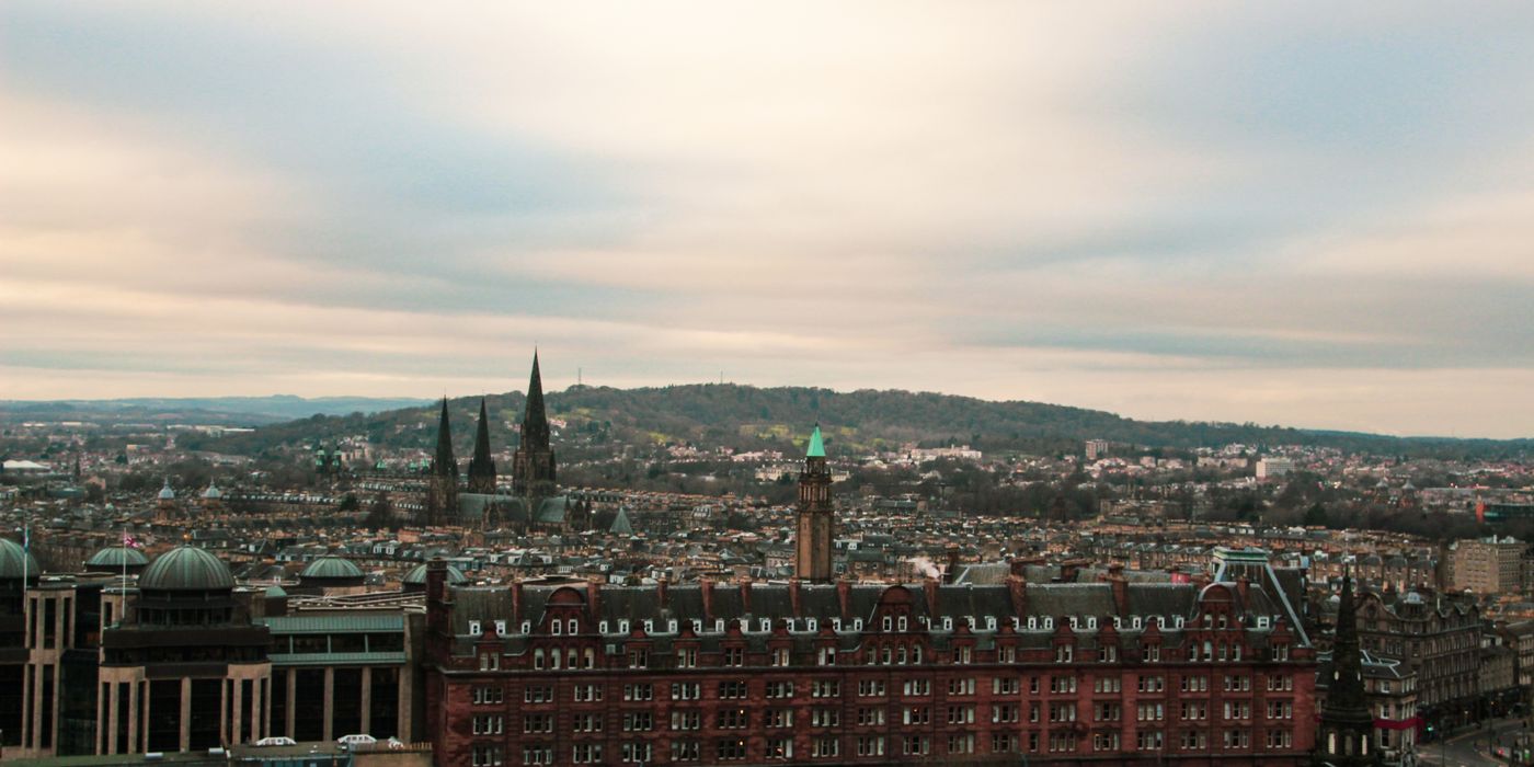 Aerial view of Edinburgh's Old Town skyline with the castle and historic rooftops
