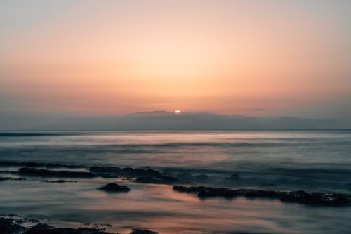Free Serene sunset over the ocean at Playa de las Américas, capturing a tranquil seascape. Stock Photo
