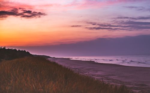 Free Stunning sunset over the Baltic Sea at Krynica Morska beach, Poland, capturing vibrant colors and serene landscape. Stock Photo