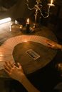 Person Holding Brown Round Table