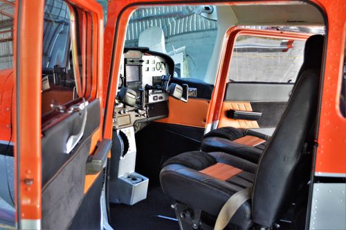 Free Explore the detailed interior of a small aircraft featuring controls and seats. Stock Photo