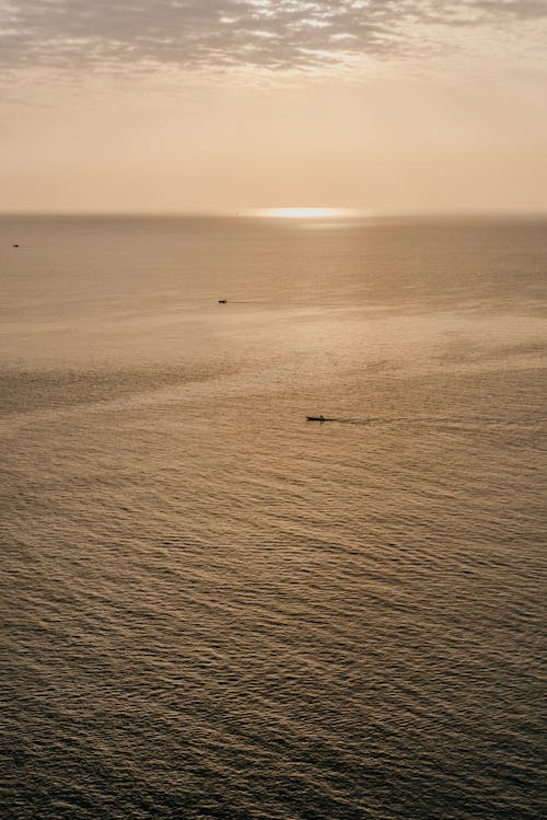 Aerial Photography of a Sea During Sunset