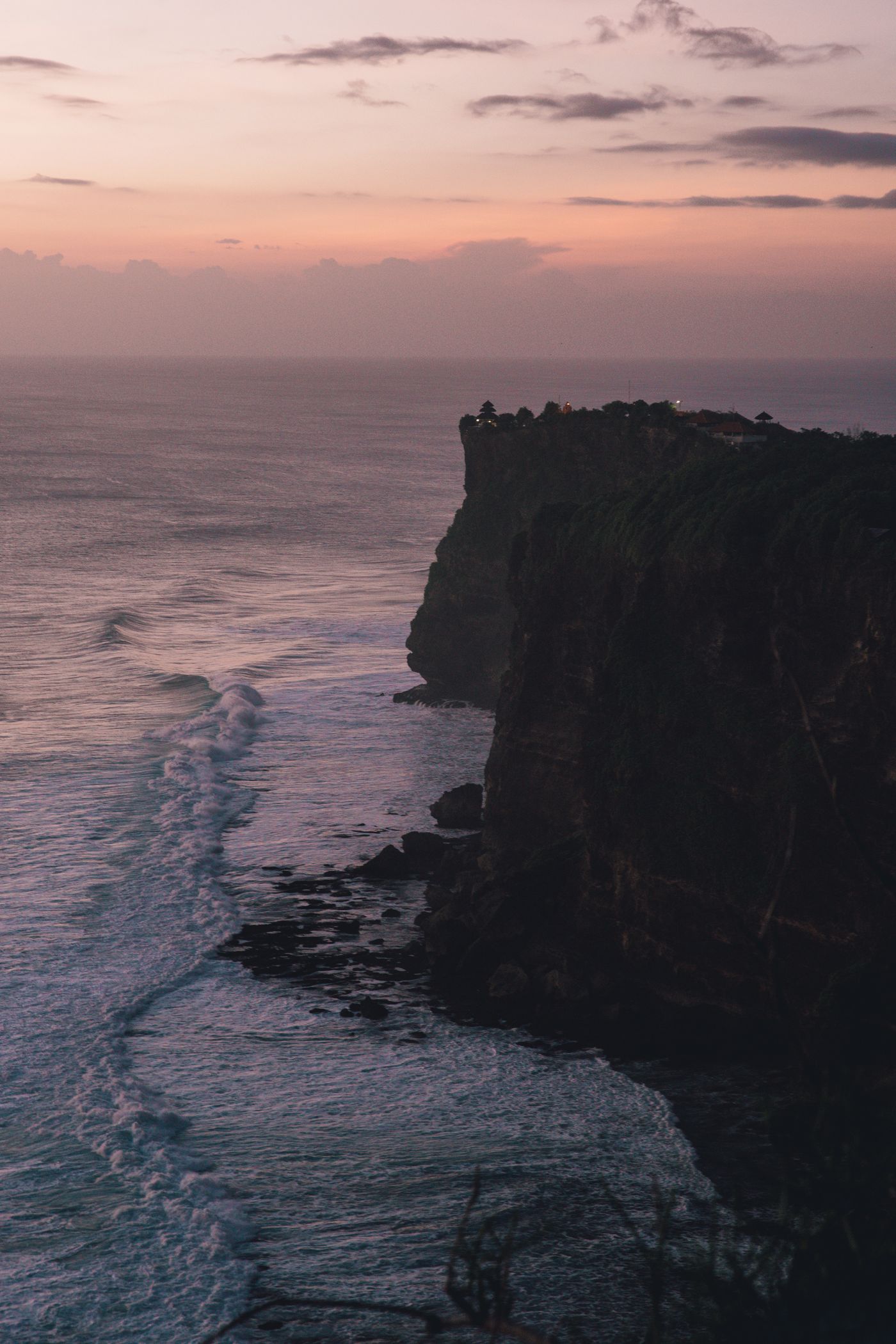 Best time to visit Uluwatu Temple 2026 sunset ocean view Bali