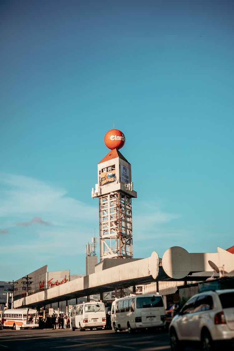 Bus Station With Tower Under Blue Sky