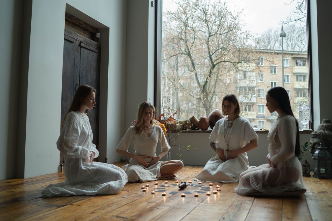 Women in White Dresses Doing Ritual Together · Free Stock Photo