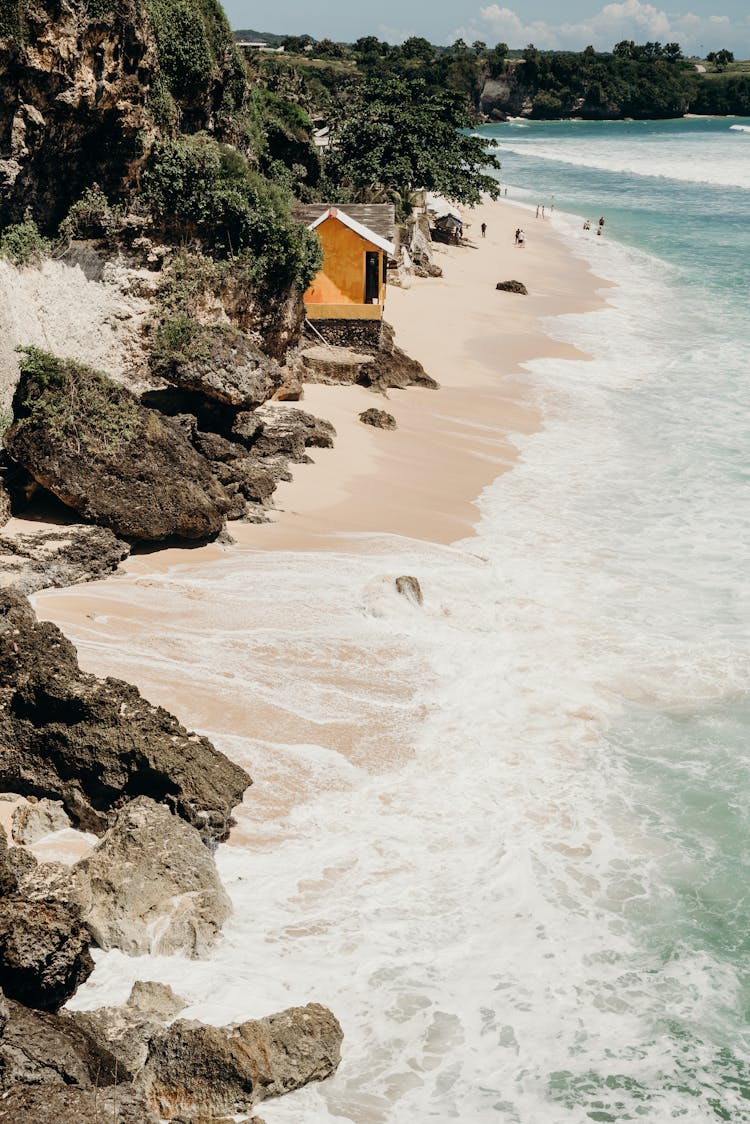 Waves Crashing The White Beach Shore