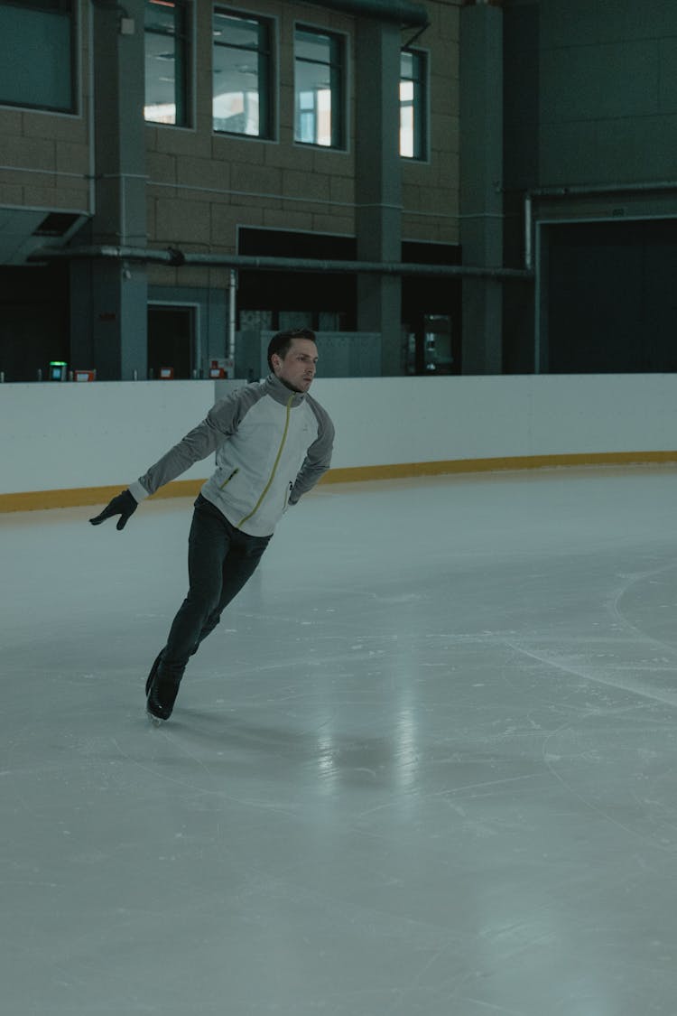 Male Skater In An Ice Skating Arena 