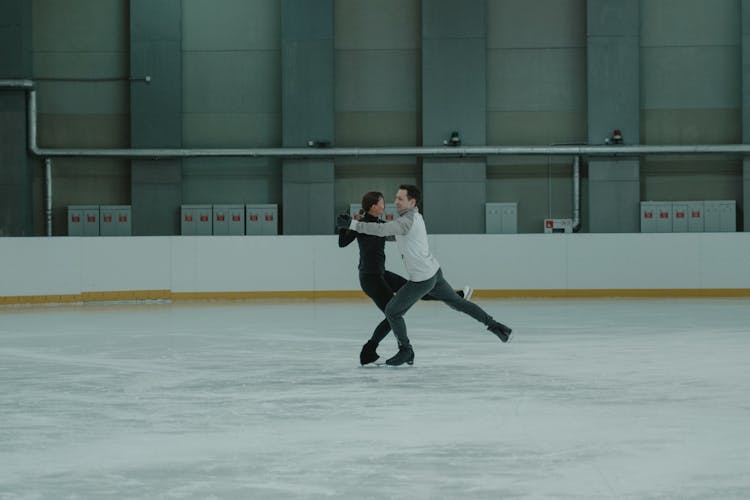 Figure Skaters On The Rink