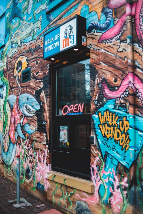 Shop on Street with Graffiti Walls