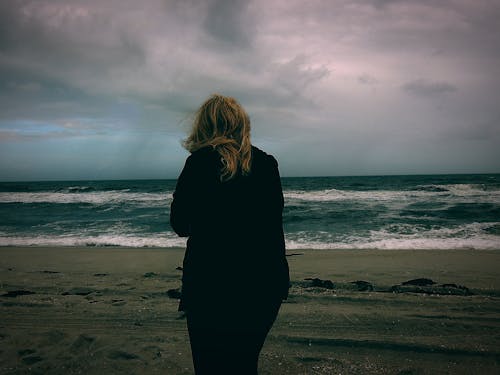 Free stock photo of asian woman, cold weather, ocean shore