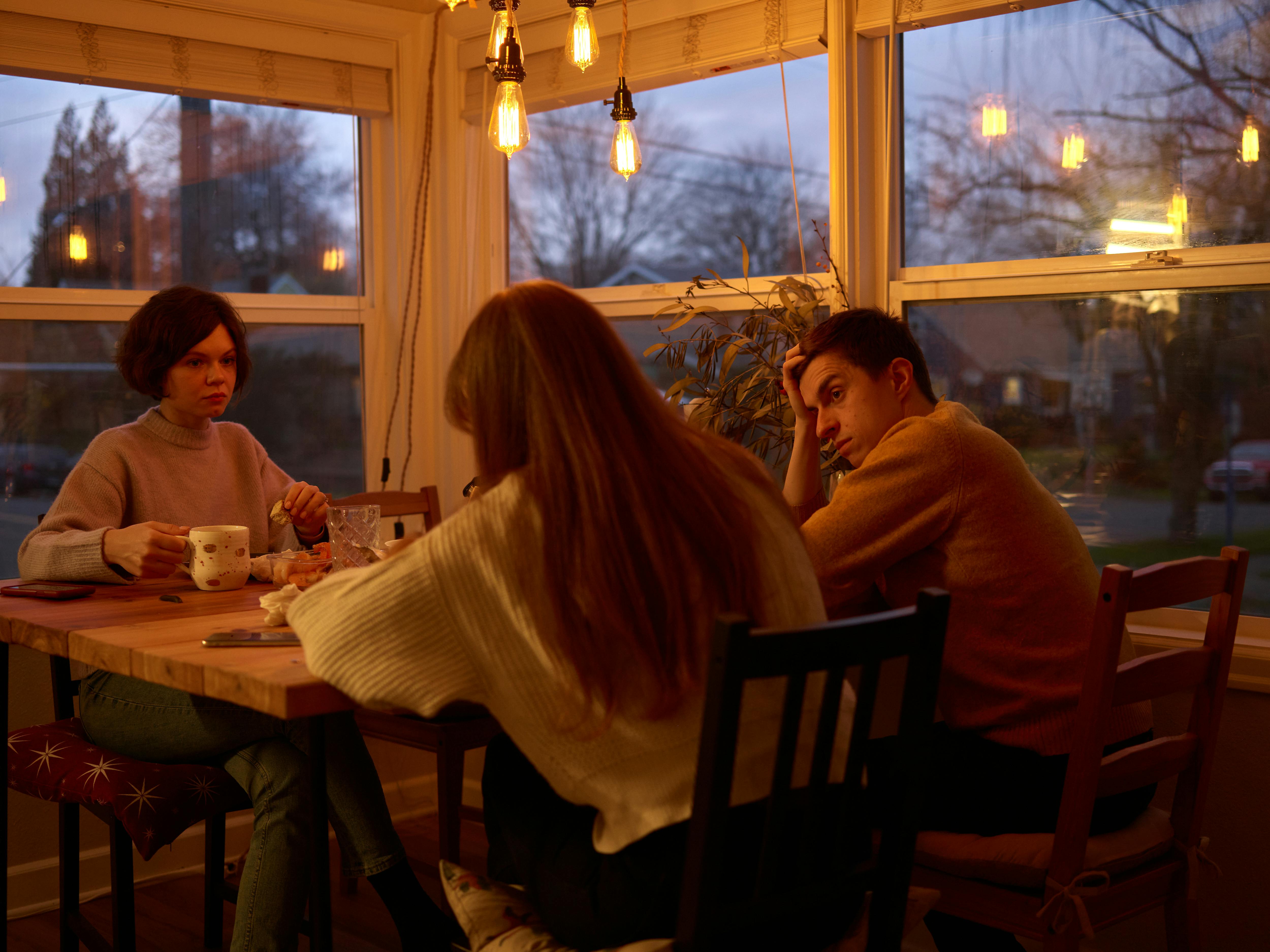 Three People Sitting at the Table · Free Stock Photo
