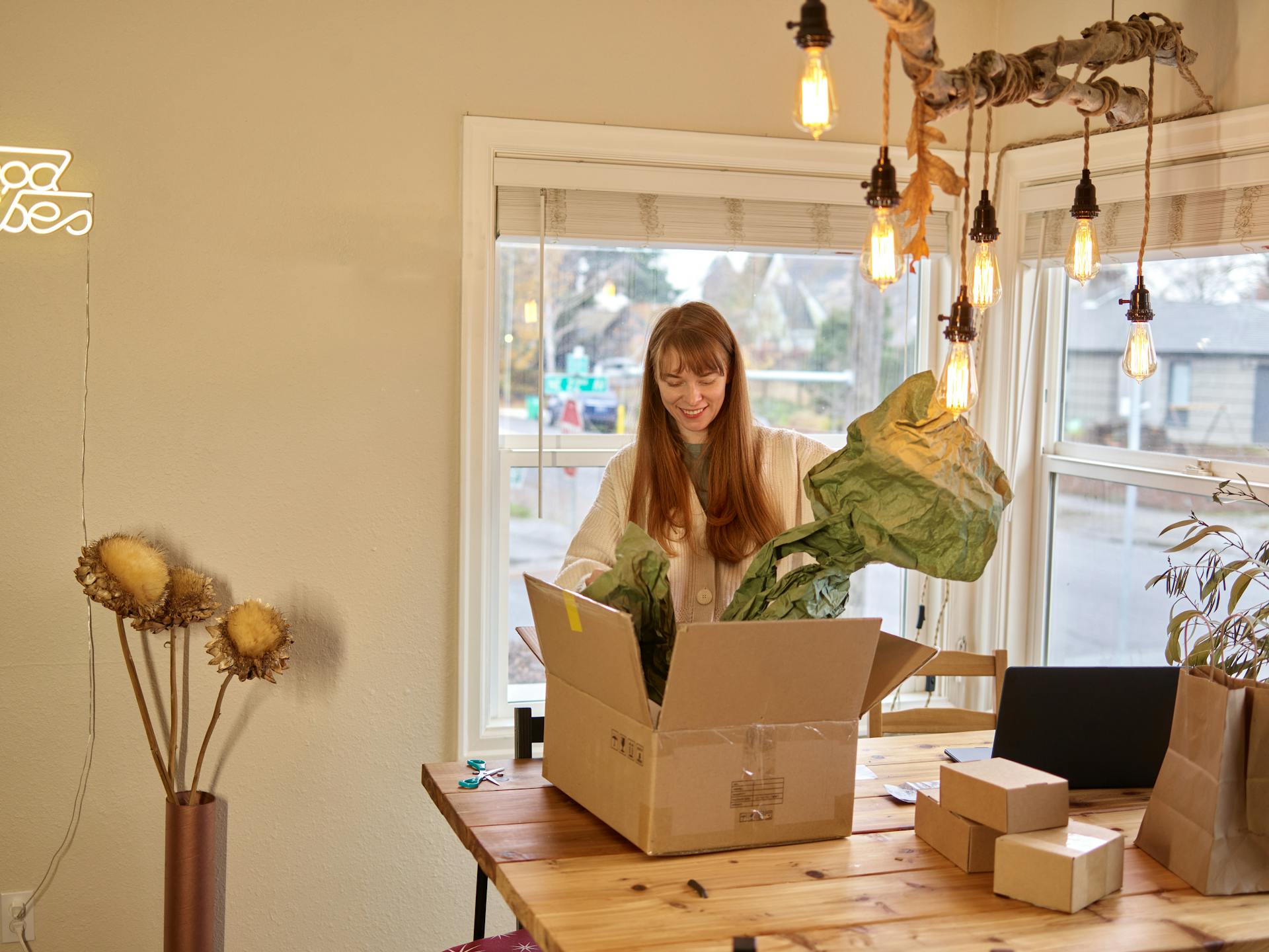 A Woman Removing the Cover on the Package