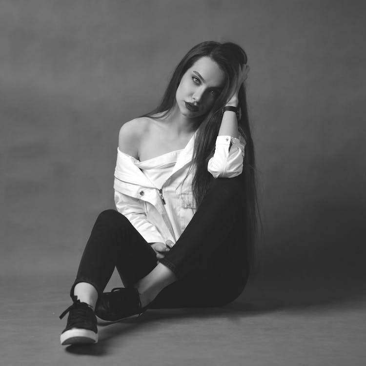 Grayscale Photo Of A Beautiful Woman Posing