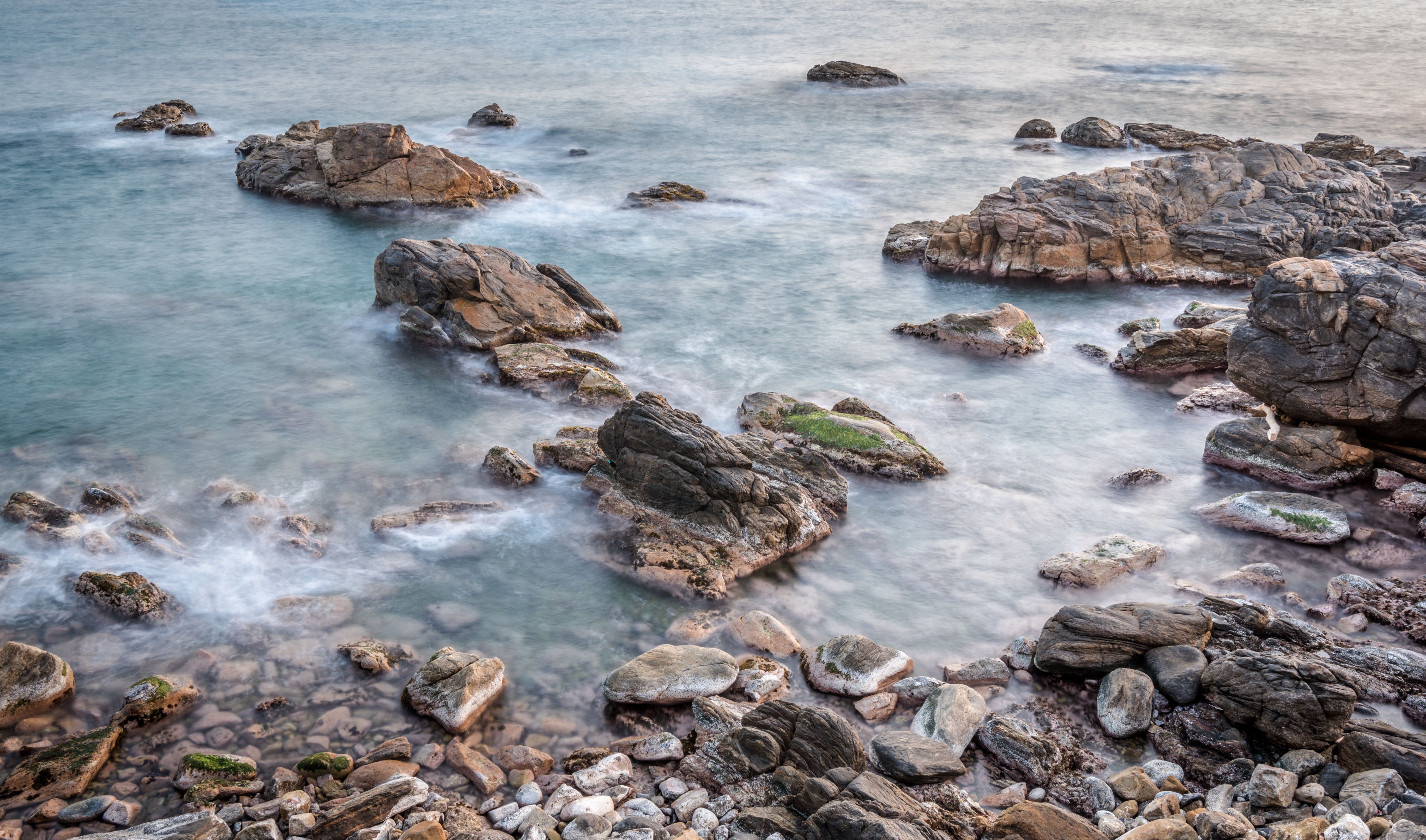 Seashore with Stones and Rocks · Free Stock Photo