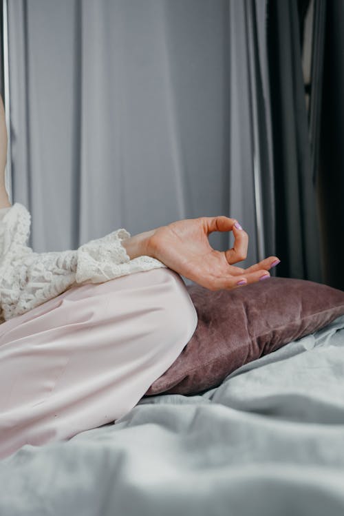 A Person in Lace Long Sleeves in Yoga Pose