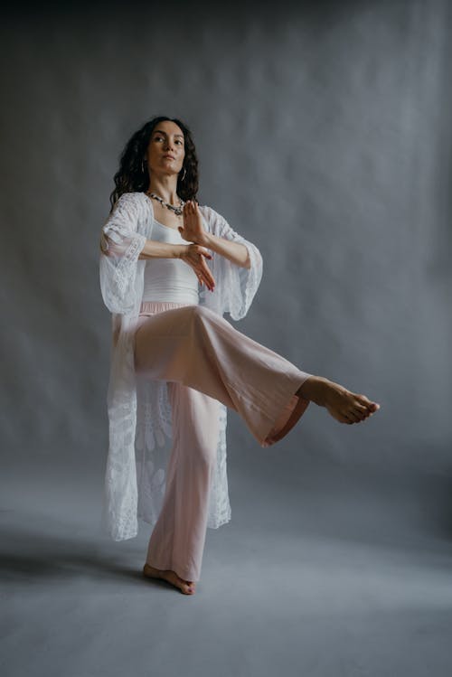 Woman in White Long Sleeve Dress