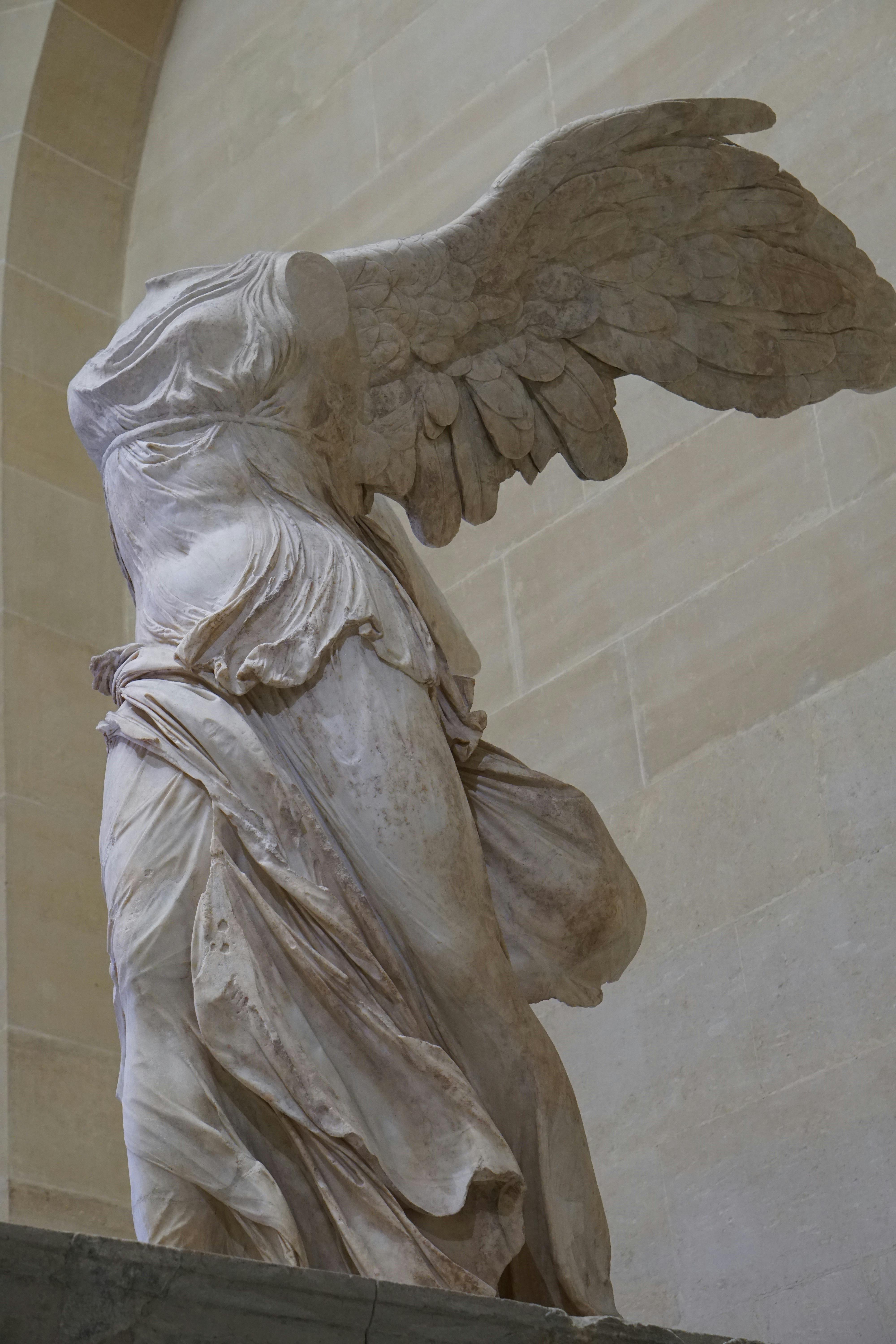 The Winged Victory of Samothrace in Louvre Museum, Paris, France · Stock Photo