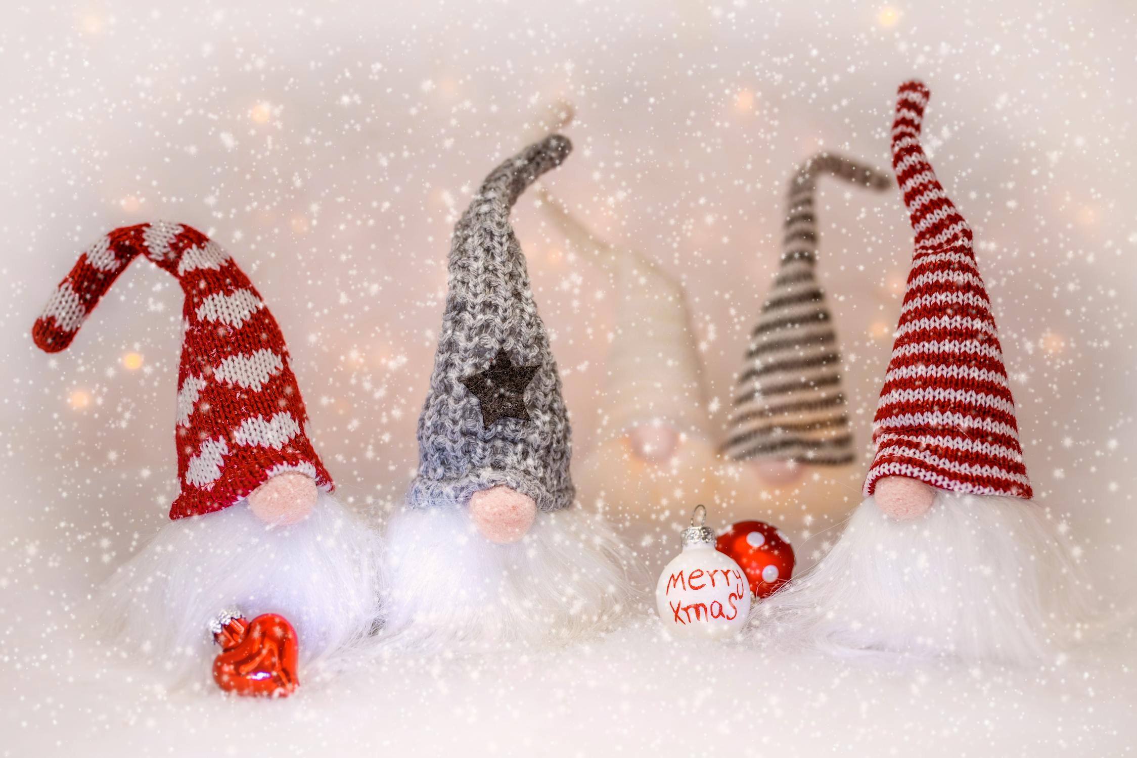 Toy gnomes with colorful baubles · Free Stock Photo
