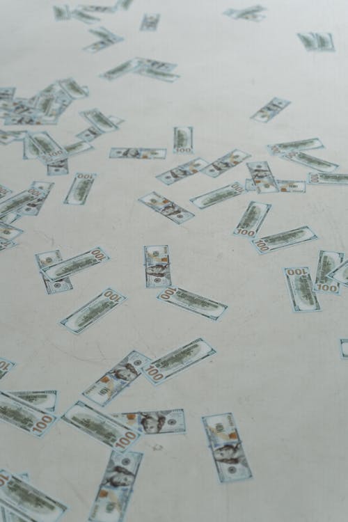 Close-Up Shot of Cash Money on the Floor