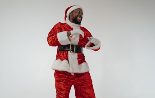 Man in Santa Claus Costume Dancing