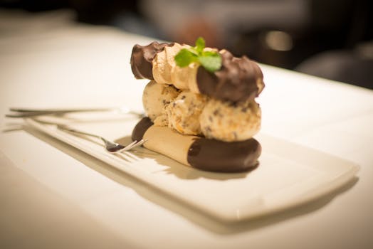 Close-up of a gourmet chocolate and meringue dessert elegantly plated.