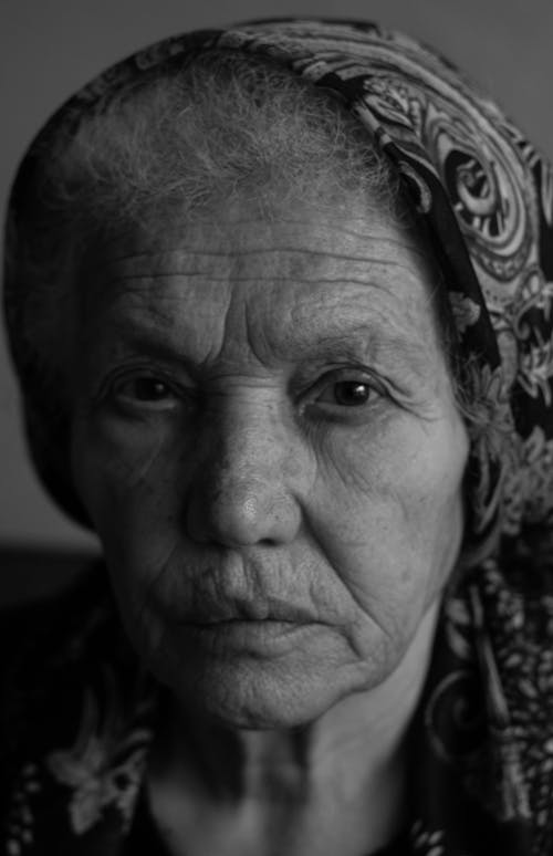 Free Grayscale Photo of Elderly Woman's Face Stock Photo