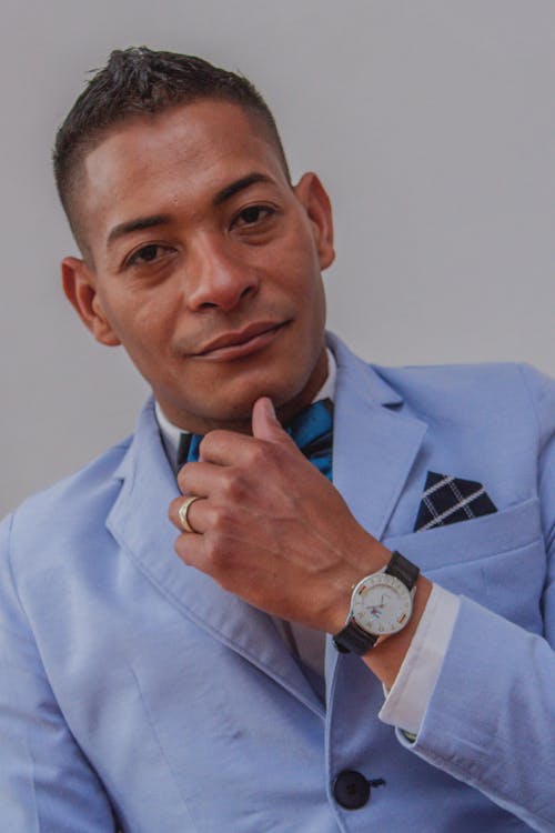 Man in Blue Suit Jacket Wearing Wristwatch