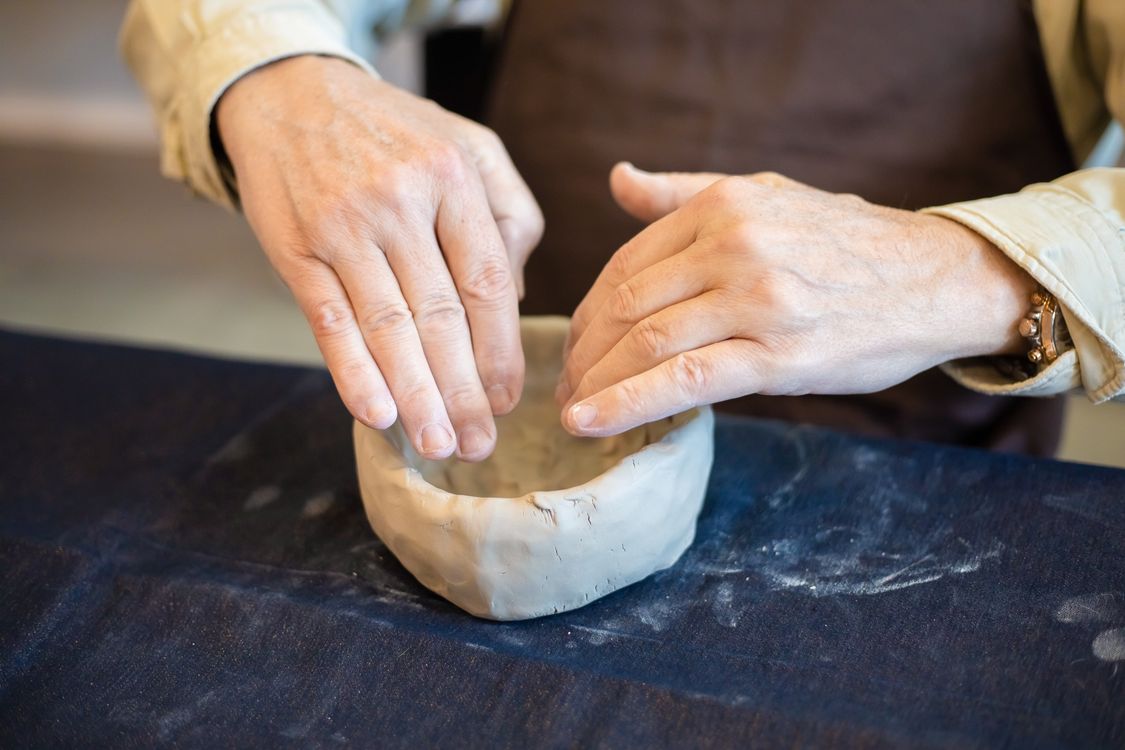 Person Using Clay Close-Up Shot of a Person a Clay · Free Stock Photo