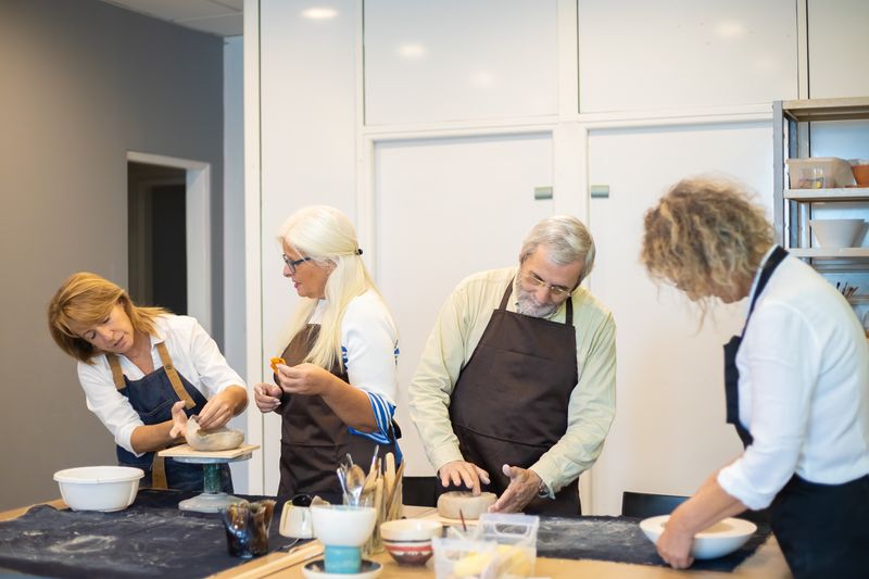 Group of adults enjoying a hands-on craft session together