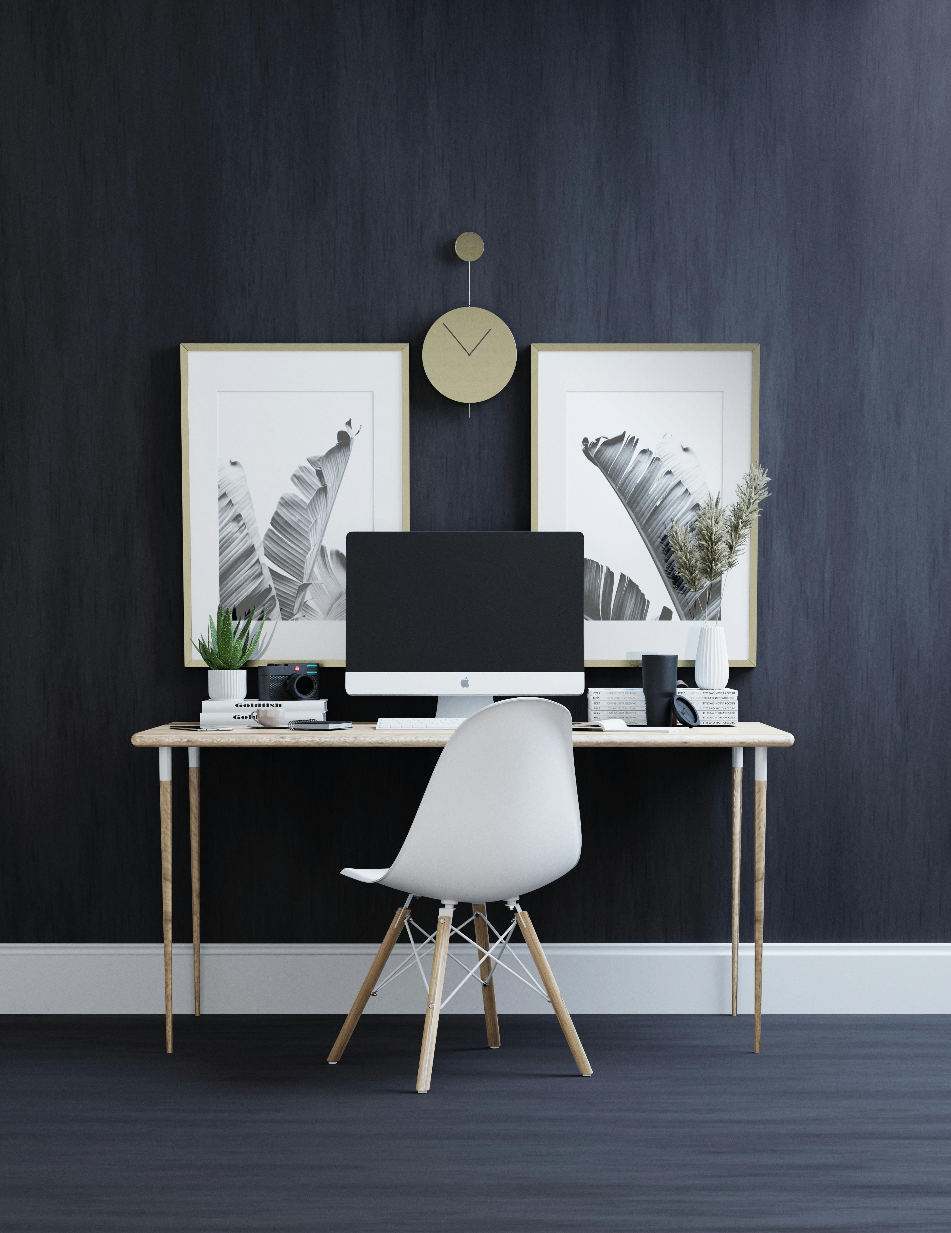 Sleek minimalist home office setup with modern furniture and decor elements.