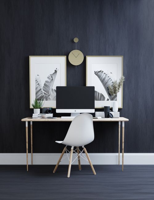 Free Sleek minimalist home office setup with modern furniture and decor elements. Stock Photo