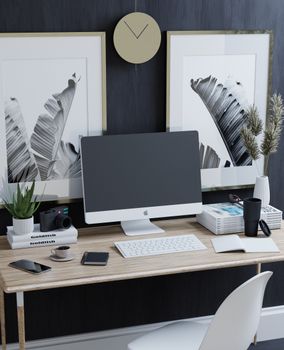 Elegant workspace showcasing a sleek desktop, decor elements, and stylish art pieces, perfect for a minimalist office setup.