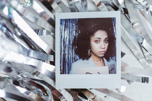 Free Person with Afro Hair in Polaroid Picture Stock Photo