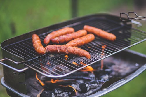 Grilling sausages