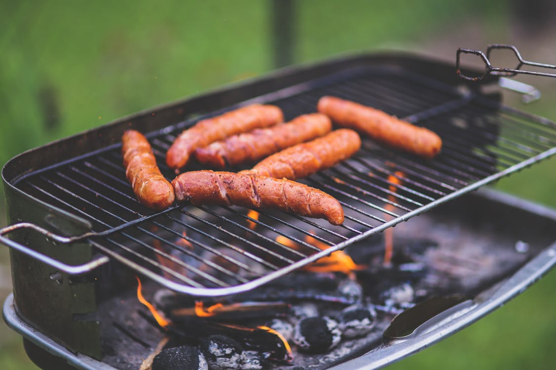 Grilling sausages