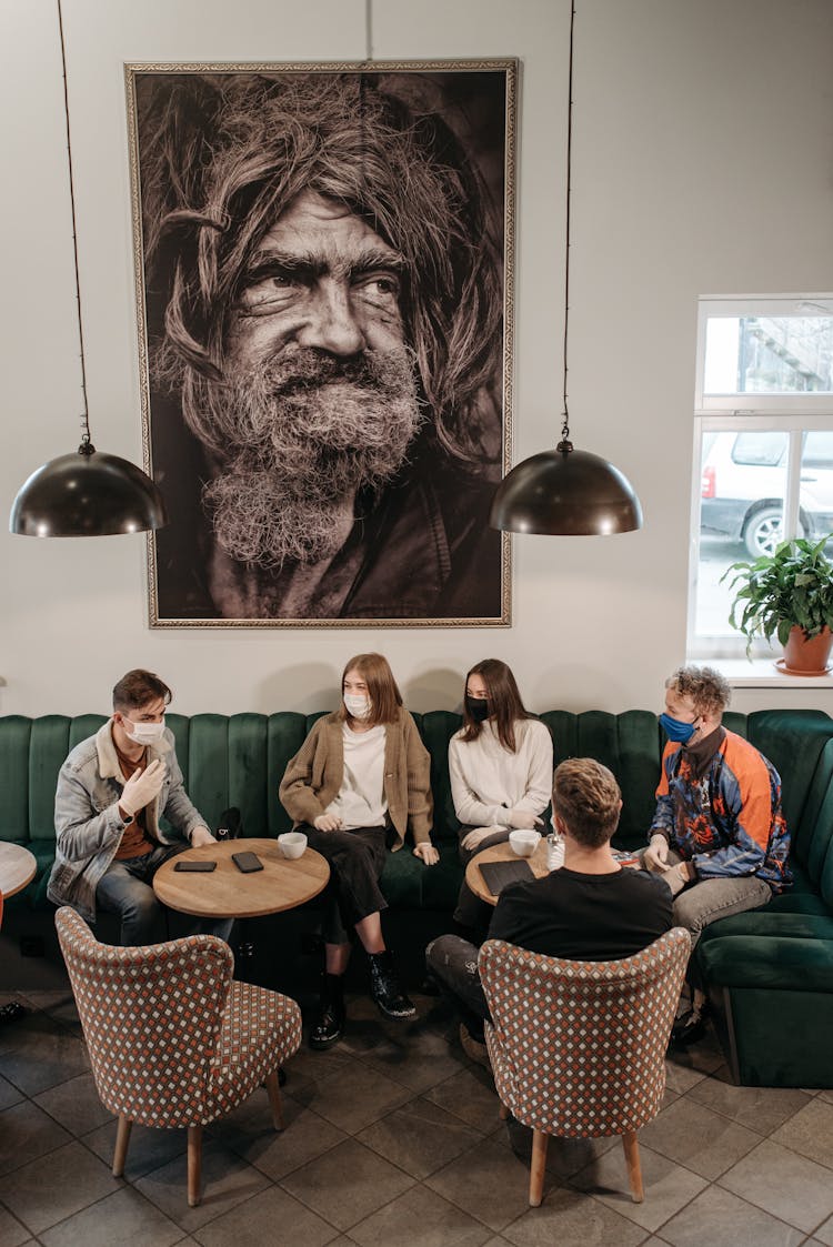 People Having A Meeting At Café