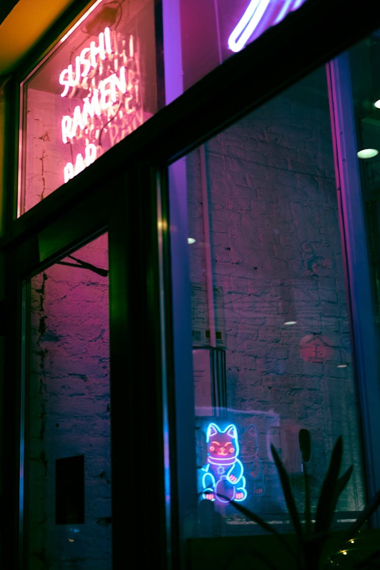 Sushi Bar With Neon Cat At Night 