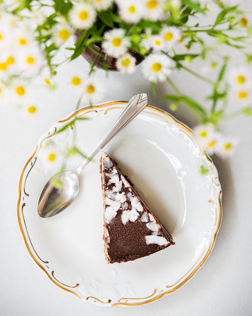 Free Photo Of Sliced Cake On A Ceramic Plate Stock Photo