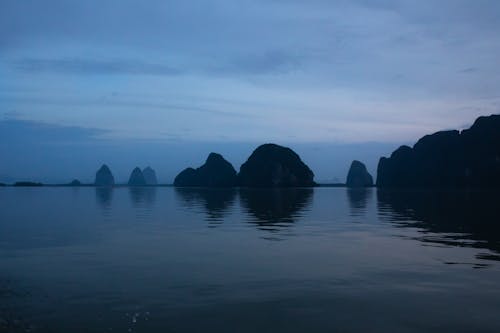 Silhouette of Mountains on the Water