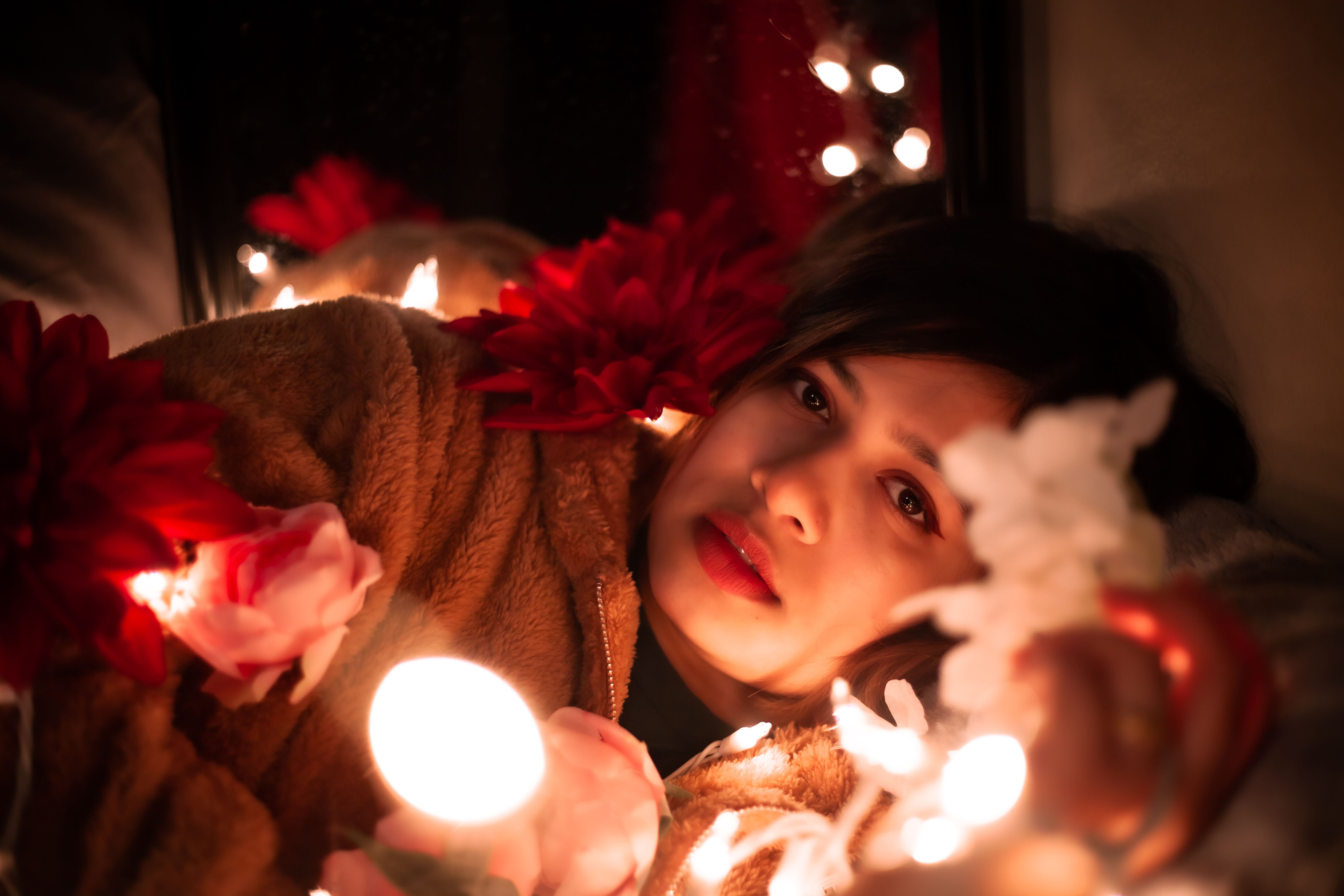Close Up Shot of a Woman in Brown Coat · Free Stock Photo