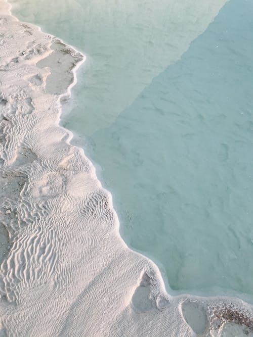 Aerial Photography of Sandy Beach and Sea 