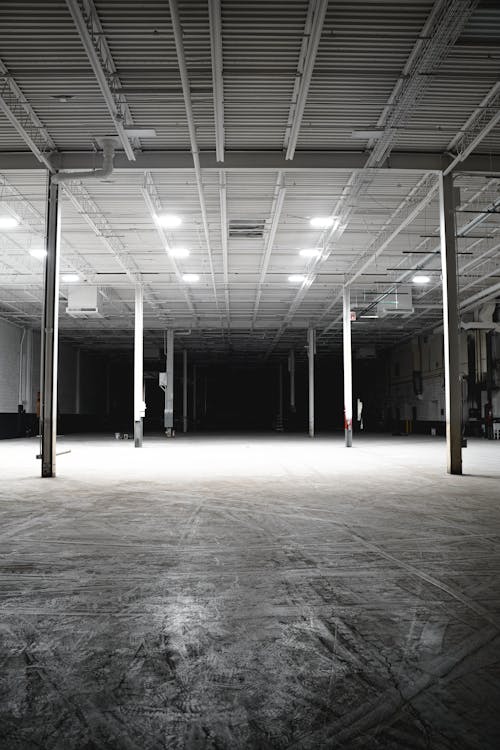 Black and White Photo of Empty Warehouse