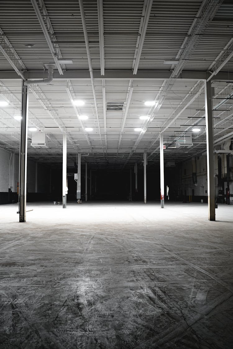 Black And White Photo Of Empty Warehouse